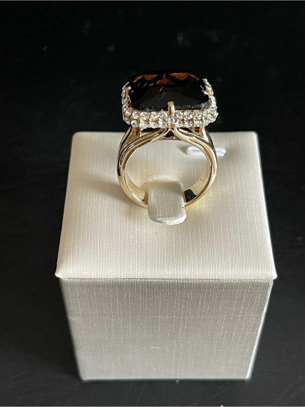 New gold tone simulated smoky quartz ring.